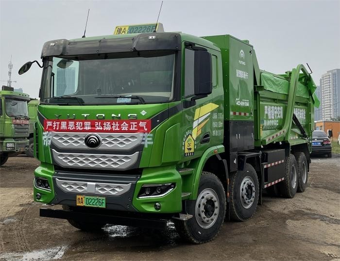 “清一色綠色軍團”，“鐵粉”為啥一次性訂購50臺宇通新能源重卡？